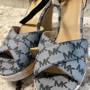 Michael Kors wedge sandals.